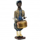 大型音乐机 黑人鼓手, 约1900年