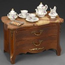 Miniature Marble-Topped Doll's Commode and Porcelain Tea Service