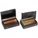 2 Musical Snuff Boxes in Composition Cases, c. 1860