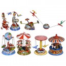 8 Lithographed Circus Tin Toys and Fairground Carousels, c. 1950
