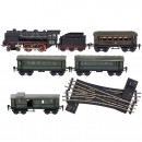 Märklin Gauge 0 Steam Locomotive with 4 Carriages and 2 Swi