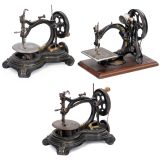 Three Hand-Operated Cast-Iron Sewing Machines